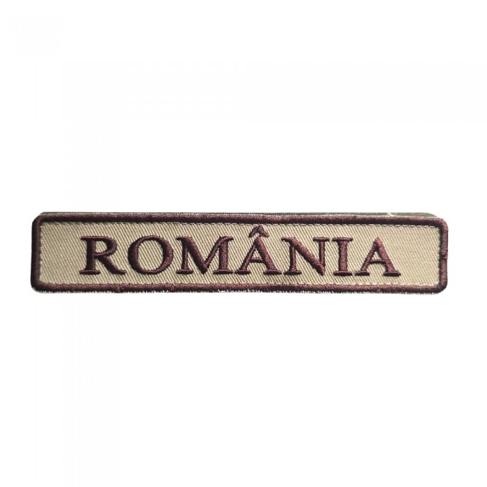 Ecuson ROMANIA Forțe Terestre 14,5 x 2,5 cm – Variantă Brodată | Lichidare Stoc Ecuson brodat ROMANIA bej 14,5 x 2,5 cm pe fond camuflaj – dimensiune neoficială
